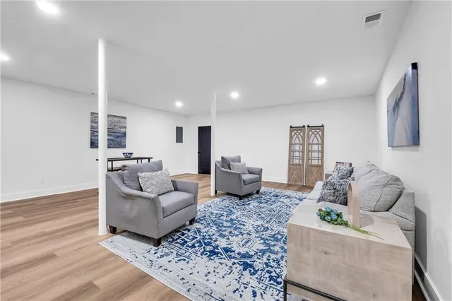 a living room with furniture and a couch