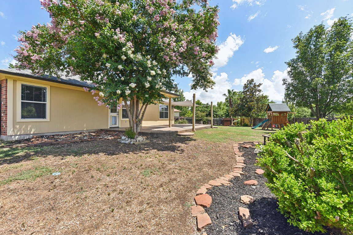 217 Newport Landing Place Round Rock, TX 78665 - Photo 28 of 30 Large Backyard offering multiples spaces to use - image a vegetable garden!