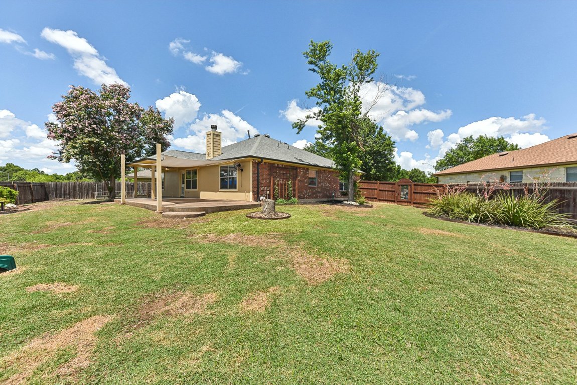 217 Newport Landing Place Round Rock, TX 78665 - Photo 30 of 30 Imagine the possibilities with this spacious backyard!