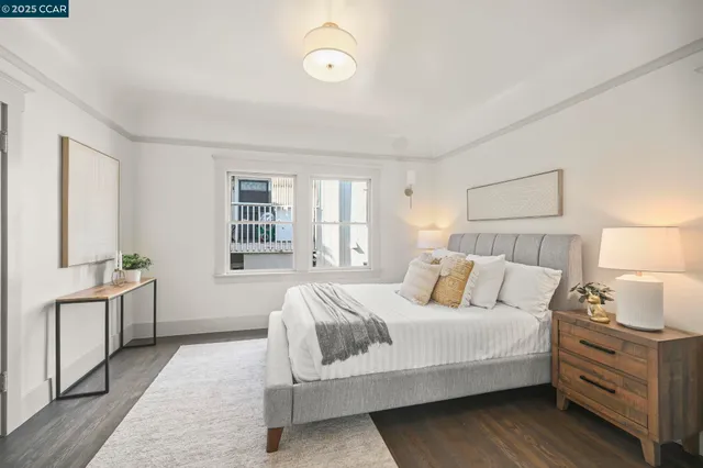 a bathroom with a sink mirror and toilet