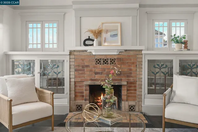 a view of a dining room with furniture wooden floor and chandelier