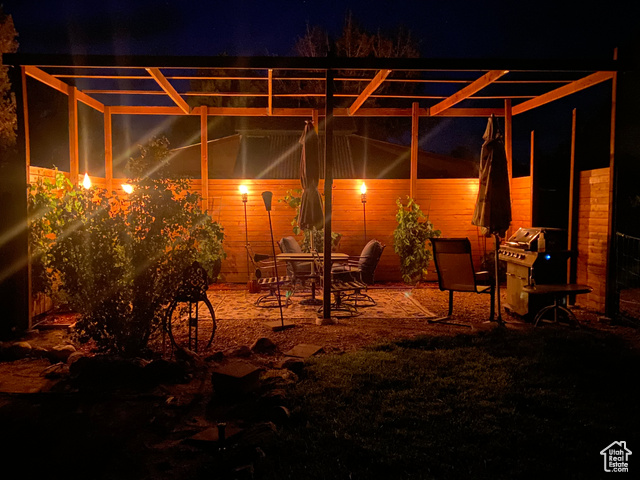 11450 Pigeon Hollow Road Spring City, UT 84662 - Photo 32 of 47 Patio at night with area for grilling and a patio