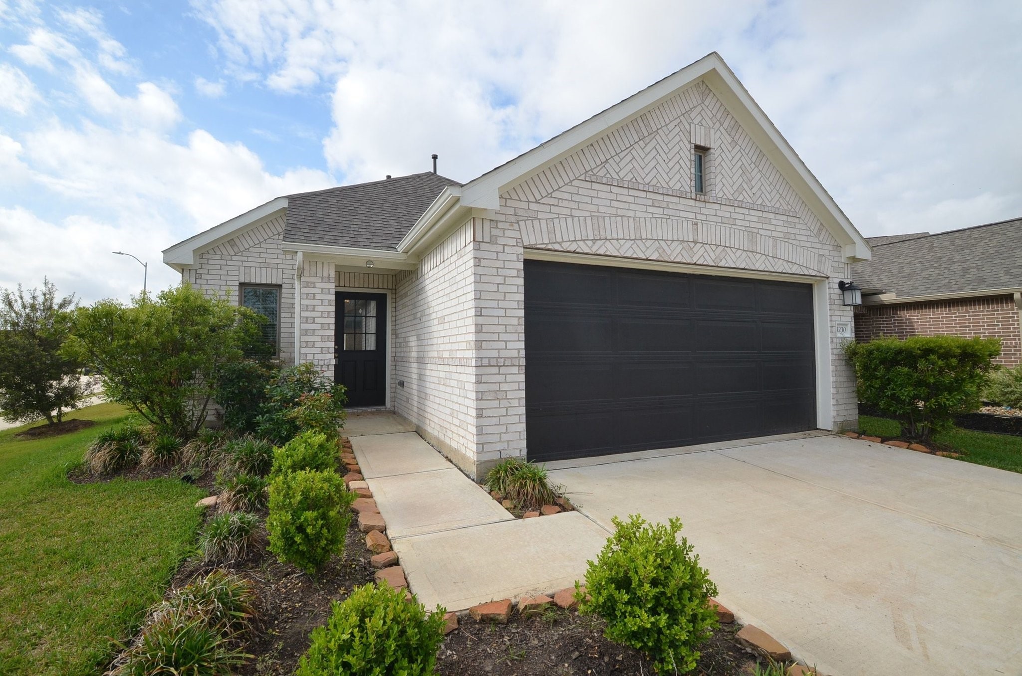 8230 Blue Fish Drive Cypress, TX 77433 - Photo 2 of 18 This charming single story brick home is located on a large corner lot!