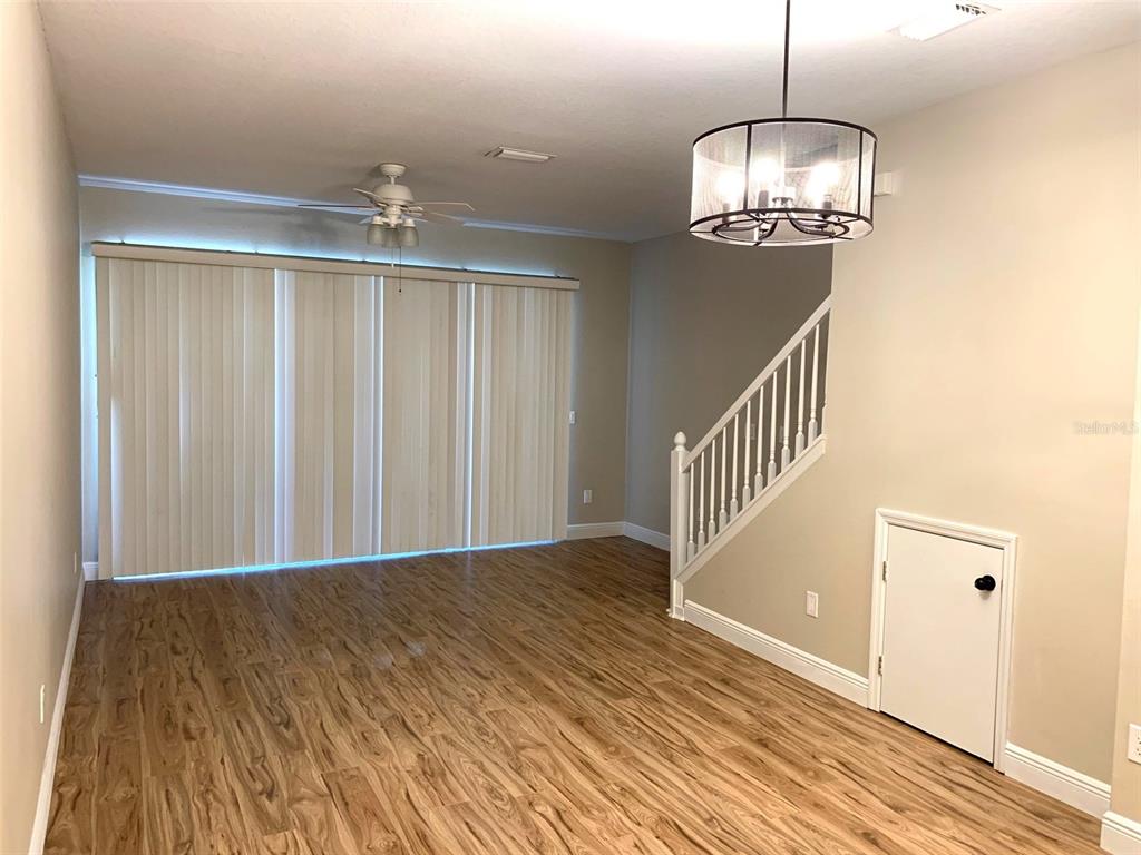 11106 Windsor Pl Circle Tampa, FL 33626 - Photo 5 of 24 a view of entryway with wooden floor