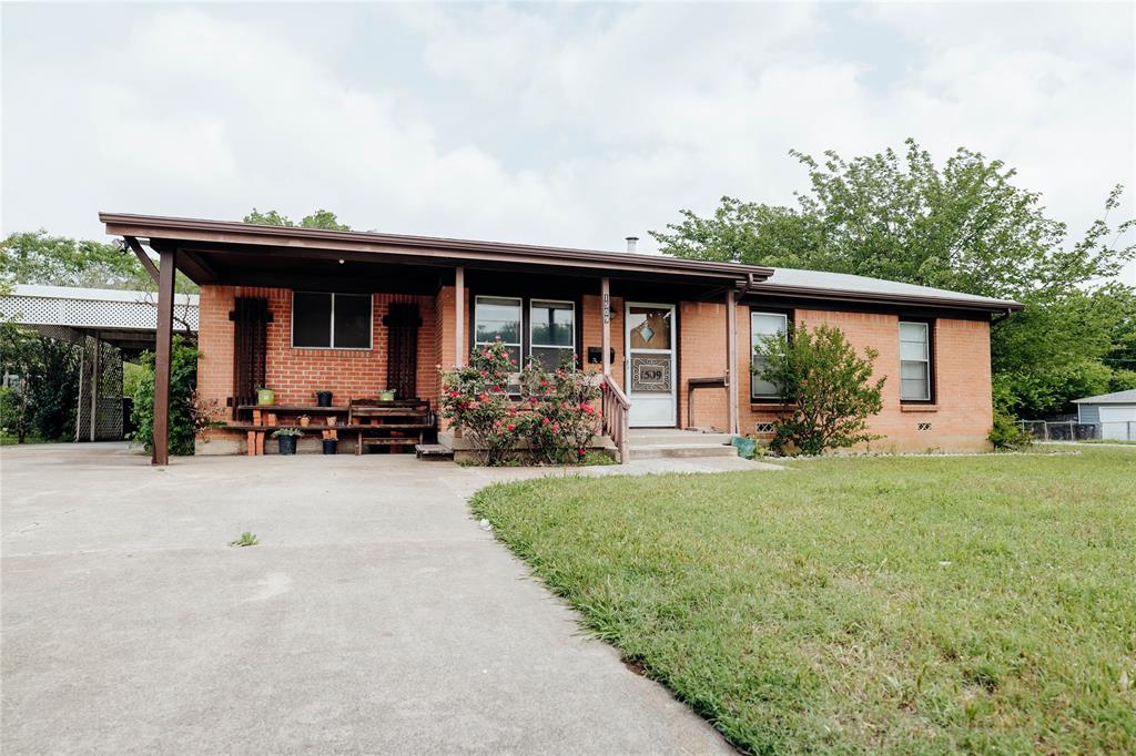 1509 Terminal Road Fort Worth, TX 76106 - Photo 1 of 1 a front view of a house with garden