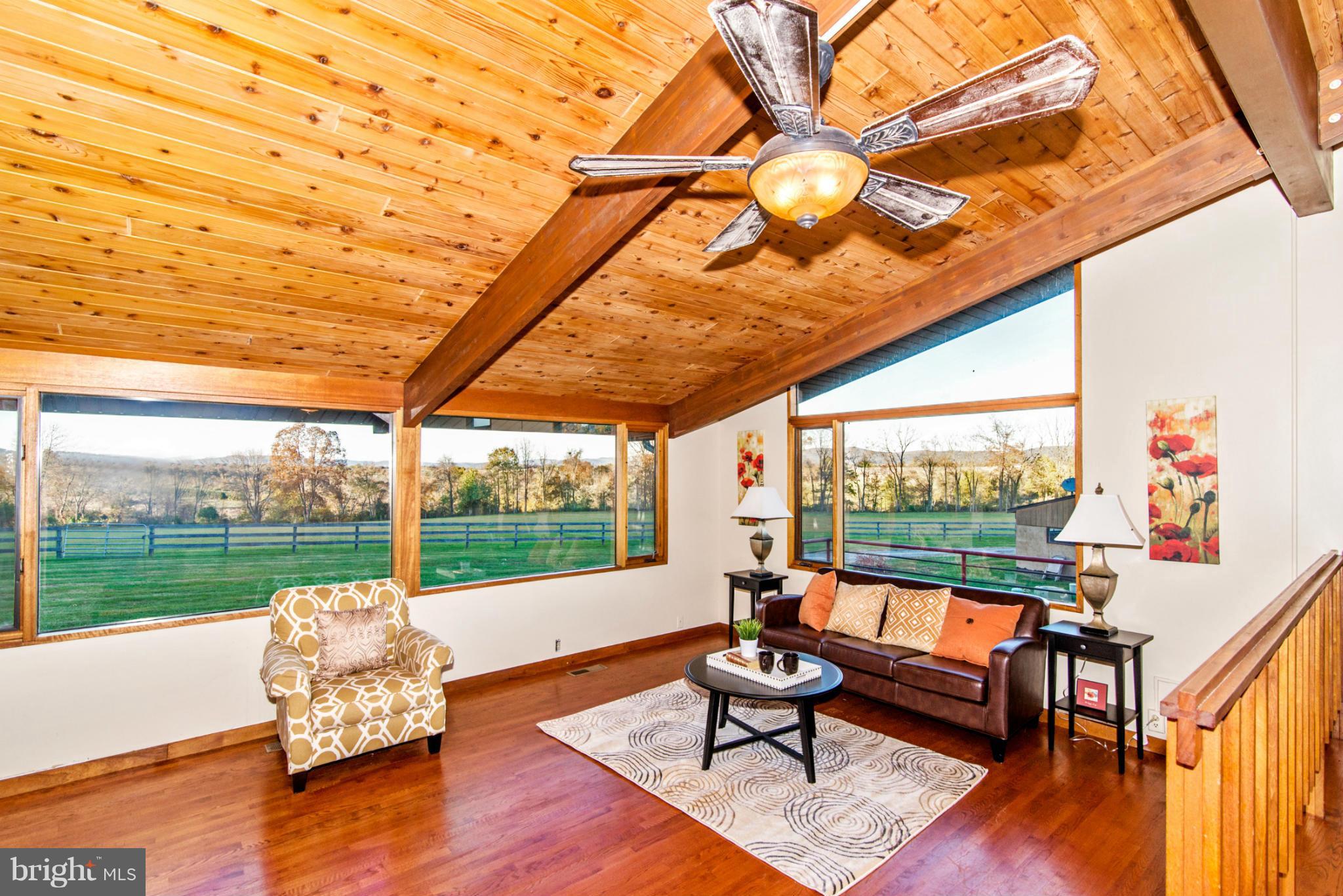 3160 Sumantown Road Middletown, MD 21769 - Photo 14 of 25 a living room with furniture and a flat screen tv