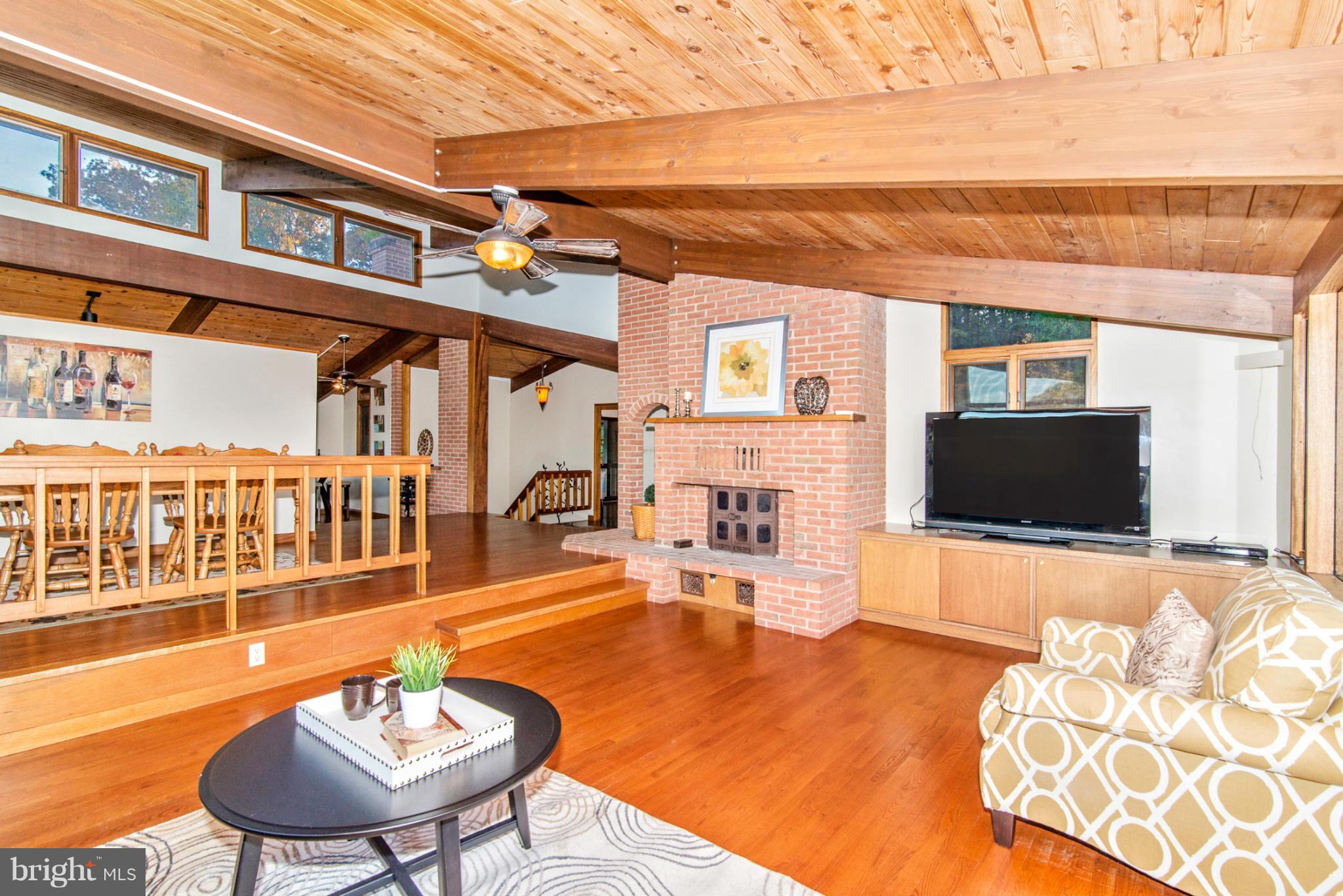 3160 Sumantown Road Middletown, MD 21769 - Photo 15 of 25 a living room with furniture and a flat screen tv