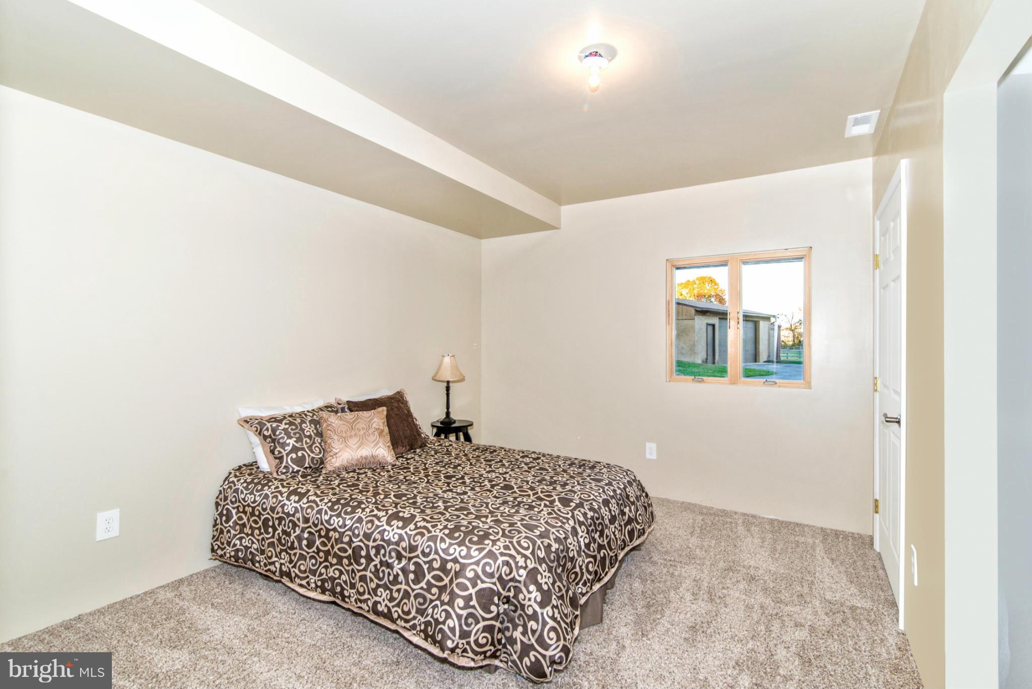 3160 Sumantown Road Middletown, MD 21769 - Photo 20 of 25 a bedroom with a bed and a window