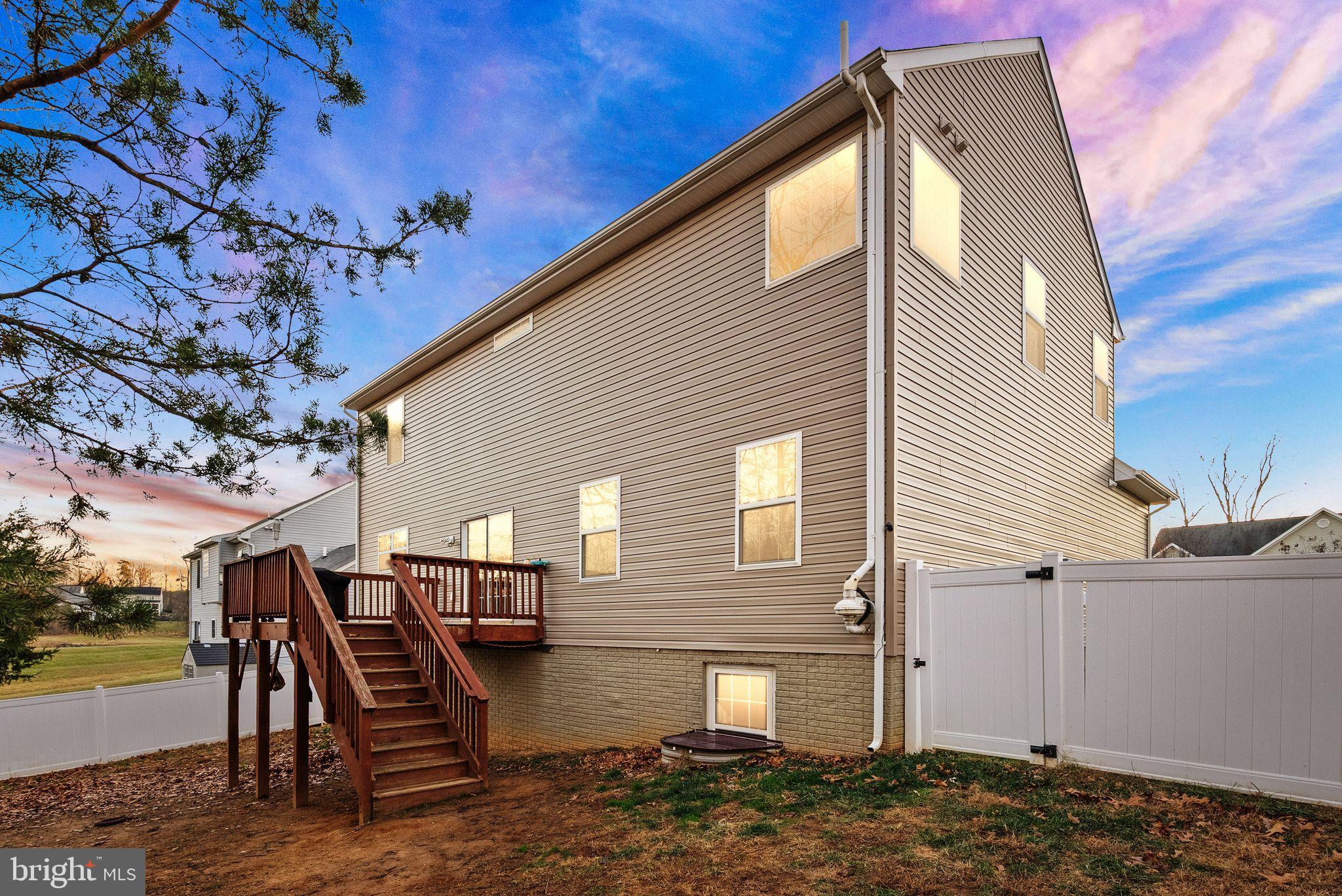 2219 Wildflower Way Locust Grove, VA 22508 - Photo 3 of 49 a view of a house with a patio