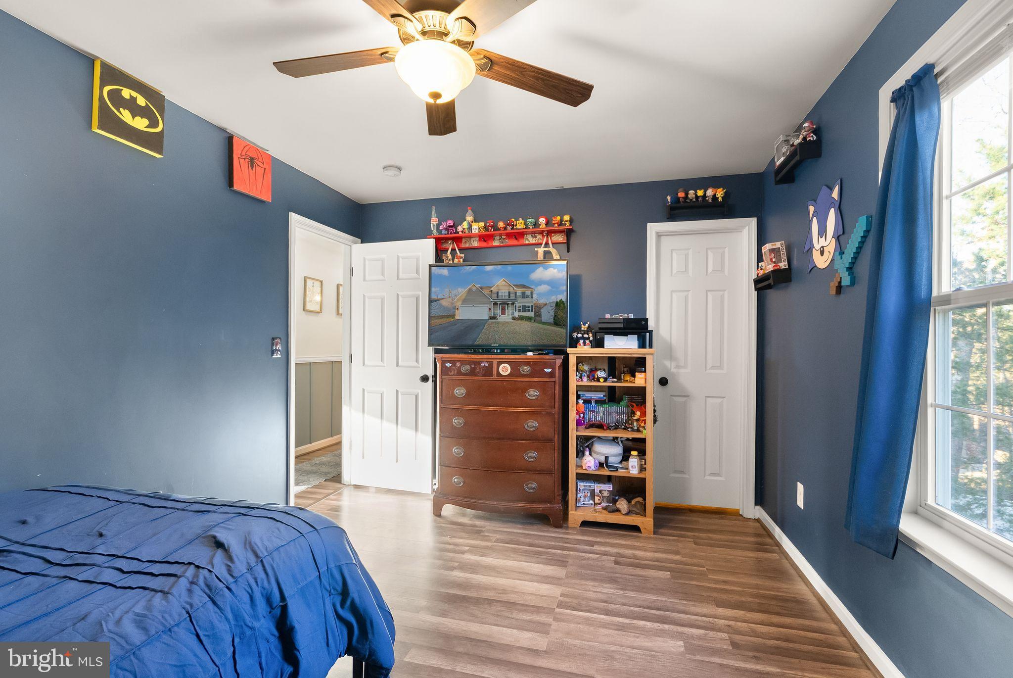2219 Wildflower Way Locust Grove, VA 22508 - Photo 34 of 49 a view of a bedroom with closet and windows