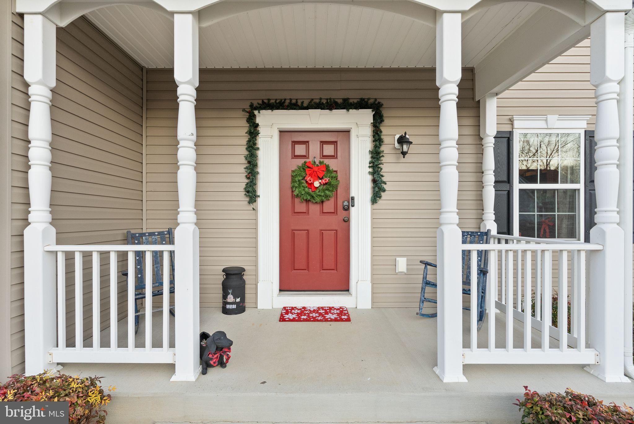 2219 Wildflower Way Locust Grove, VA 22508 - Photo 8 of 49 a front view of a house with entrance