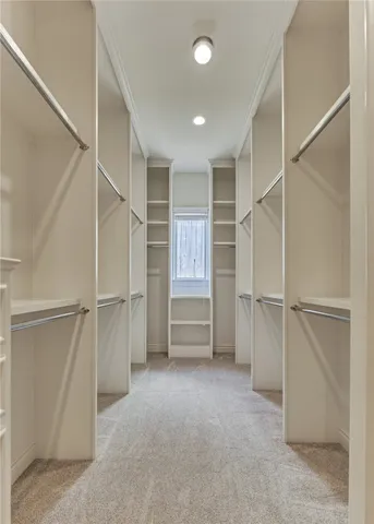 a view of an empty walk in closet