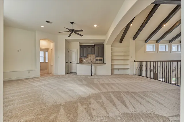 a view of a livingroom with a staircase