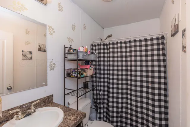 a kids room with toys and a window