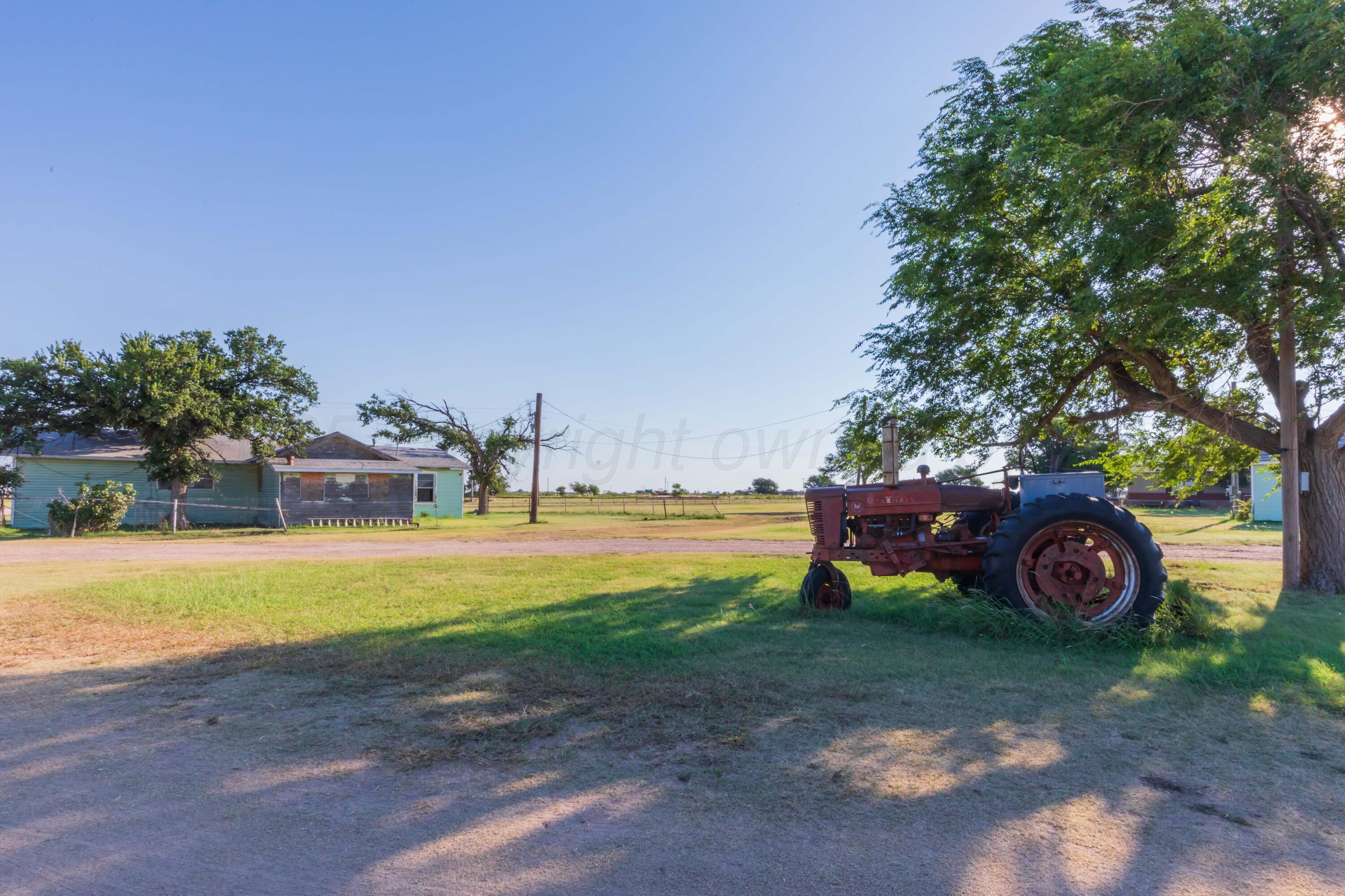 11566 County Road East Pampa, TX 79065 - Photo 39 of 56 a view of a house with yard space and street view
