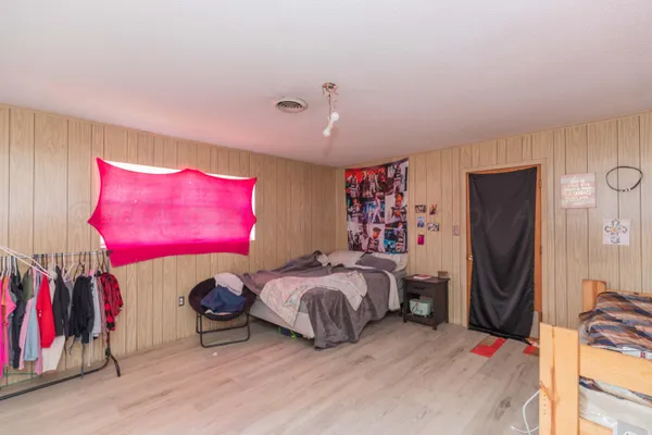 a view of a chairs and tables in patio