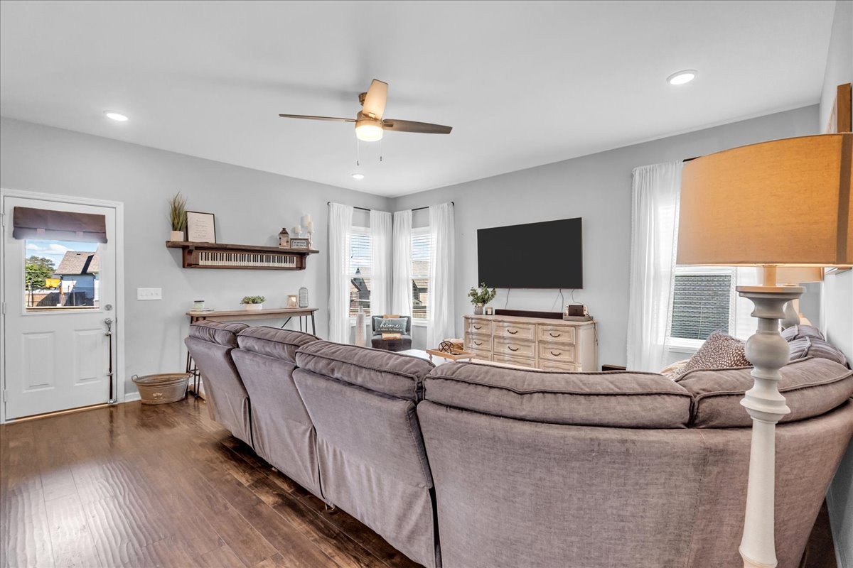 124 Cordell Love Road Smithville, TN 37166 - Photo 29 of 58 a living room with furniture and a flat screen tv