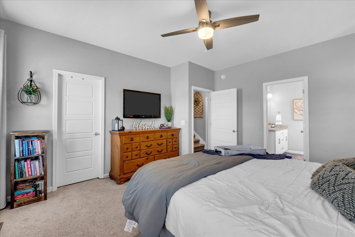 124 Cordell Love Road Smithville, TN 37166 - Photo 36 of 58 a bedroom with a bed and a flat screen tv