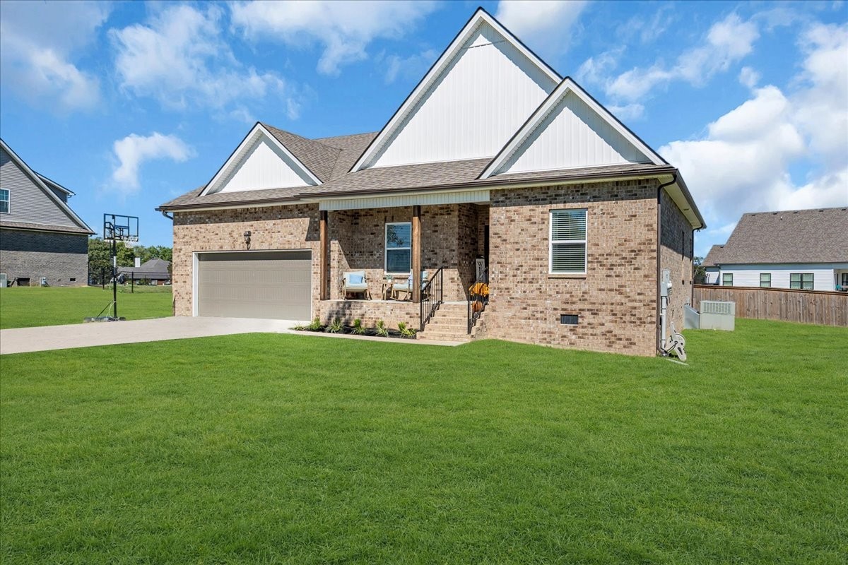 124 Cordell Love Road Smithville, TN 37166 - Photo 4 of 58 a front view of a house with a yard
