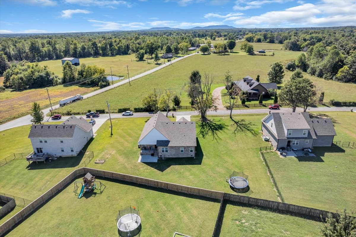 124 Cordell Love Road Smithville, TN 37166 - Photo 56 of 58 a view of a swimming pool with a patio and a garden