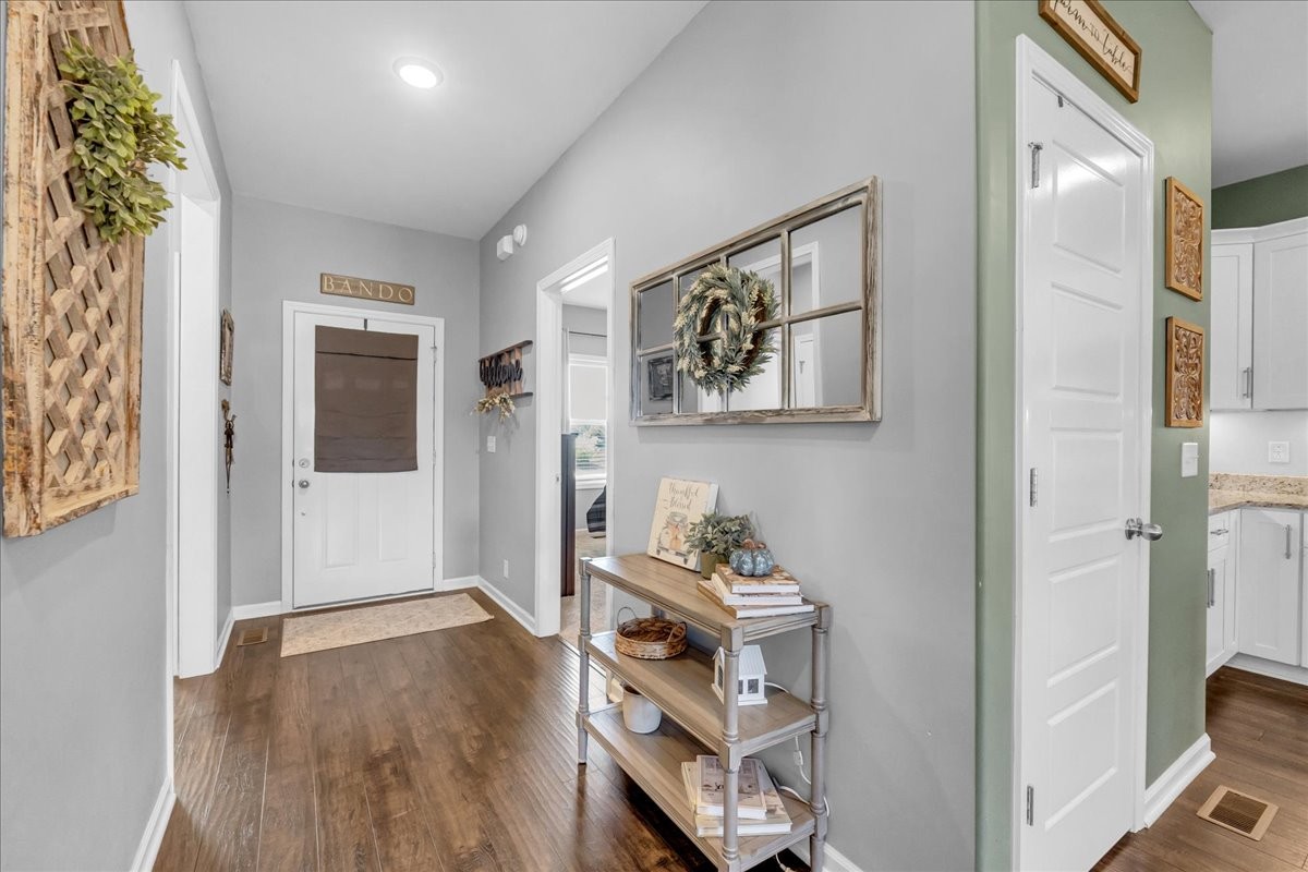 124 Cordell Love Road Smithville, TN 37166 - Photo 7 of 58 a view of room with window and wooden floor