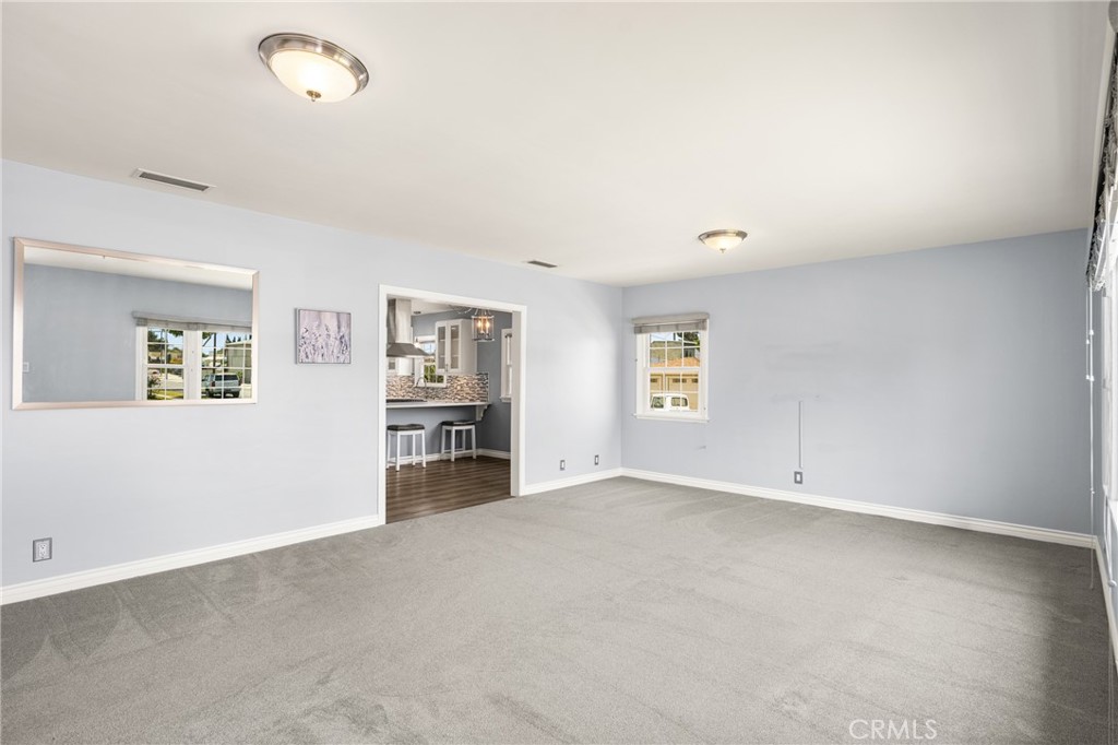 2229 Cowlin Avenue Commerce, CA 90040 - Photo 6 of 34 an empty room with closet and natural light