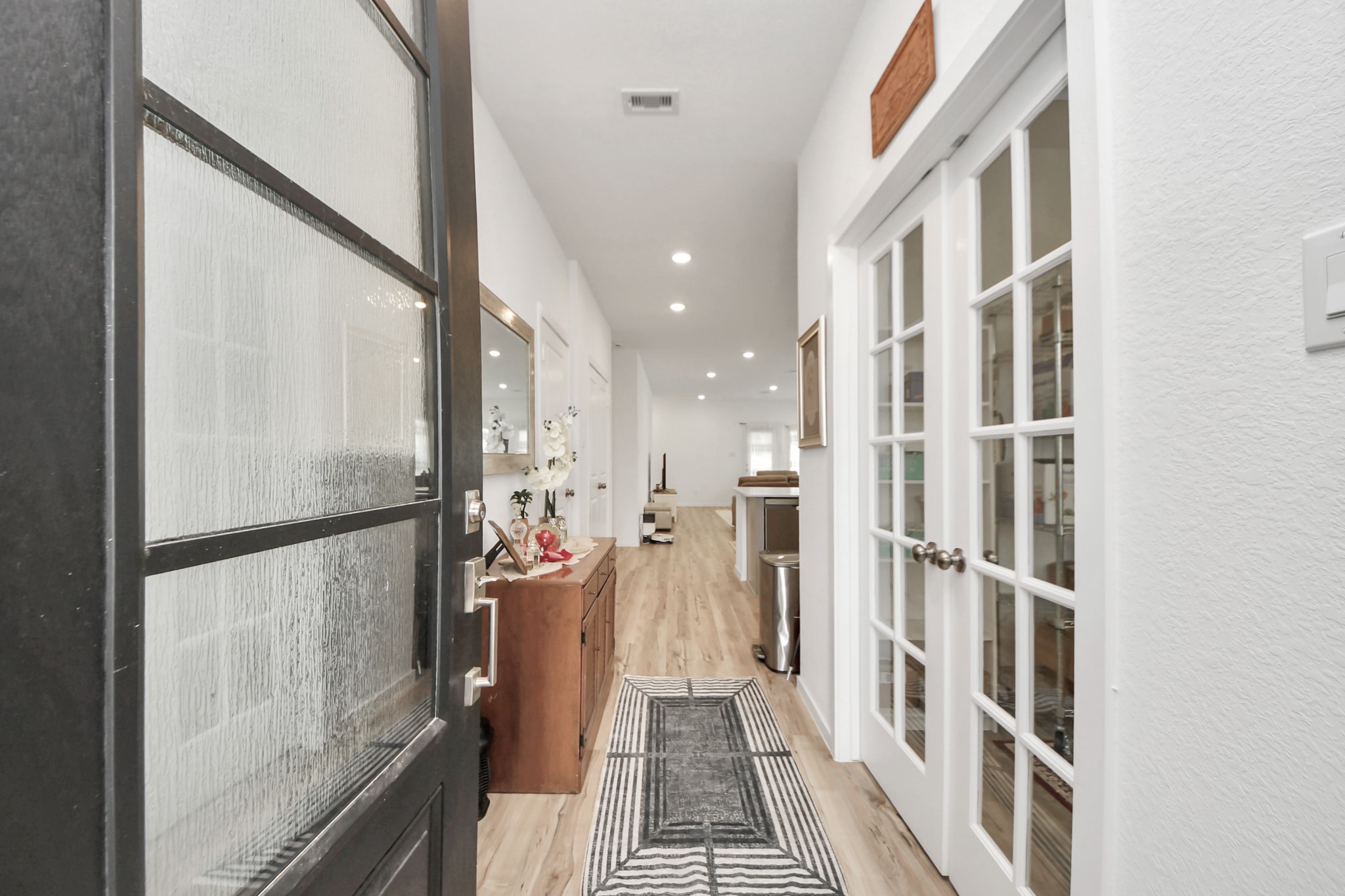 21927 Citrus Grove Cypress, TX 77433 - Photo 11 of 42 a view of a living room with a floor to ceiling window