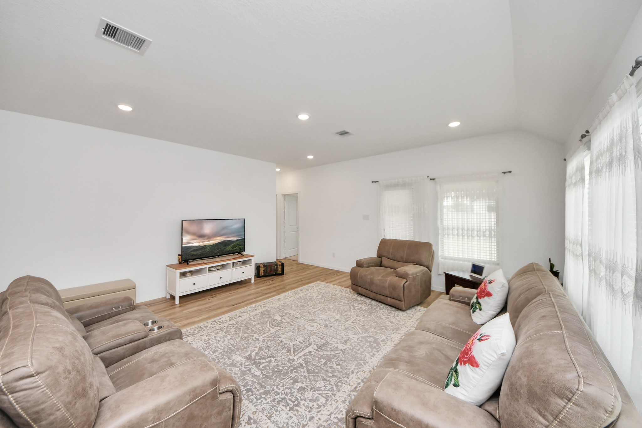 21927 Citrus Grove Cypress, TX 77433 - Photo 22 of 42 a living room with furniture and a flat screen tv