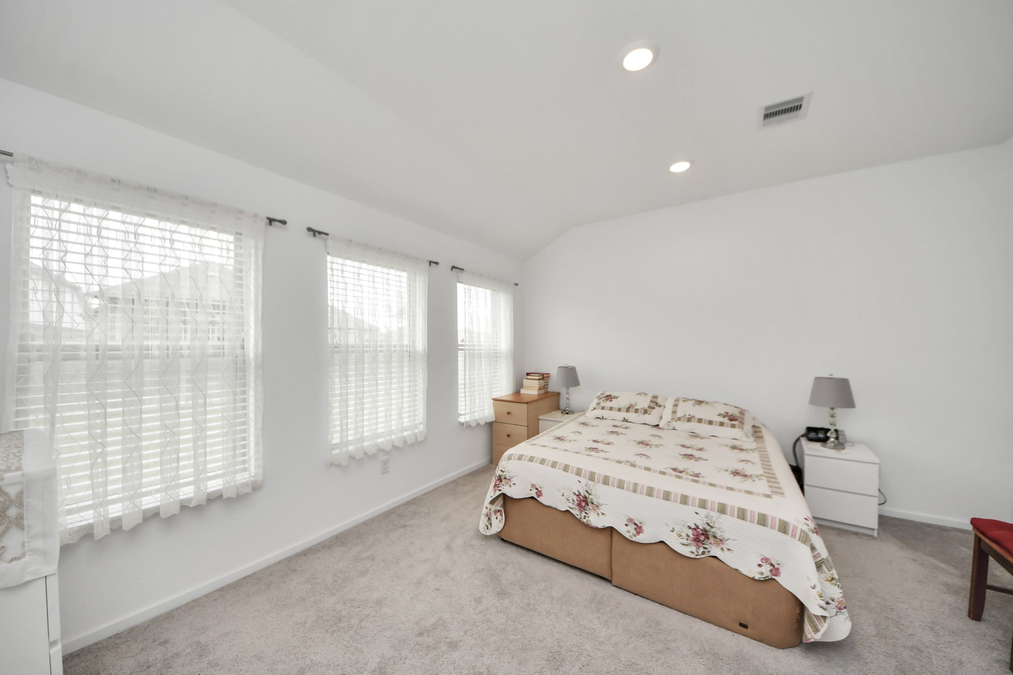 21927 Citrus Grove Cypress, TX 77433 - Photo 24 of 42 a bedroom with a bed and a large window