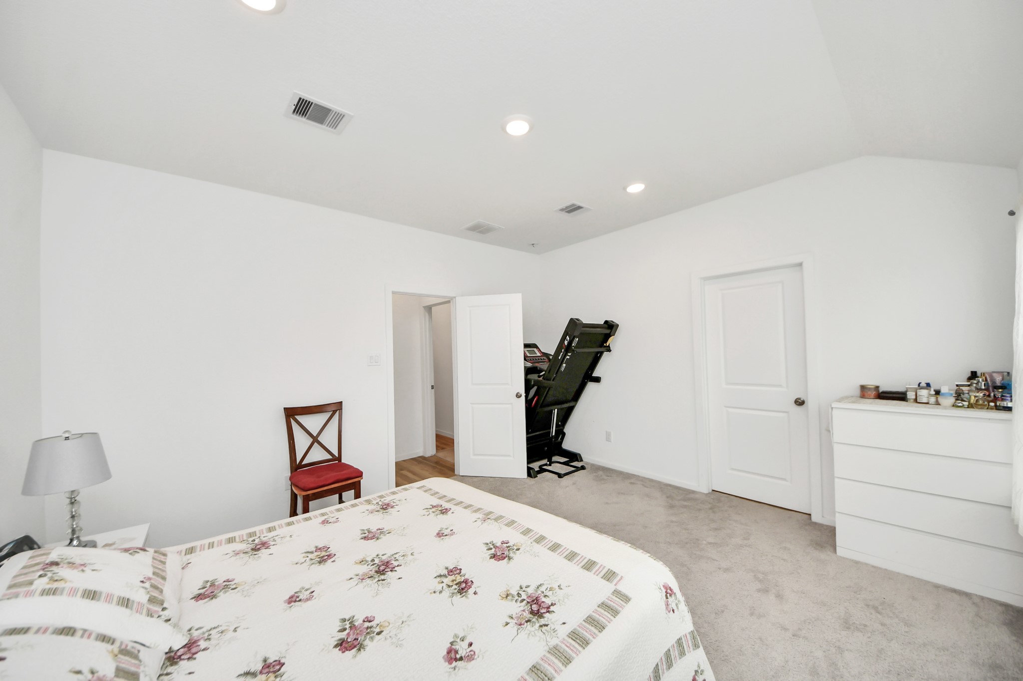 21927 Citrus Grove Cypress, TX 77433 - Photo 26 of 42 a bedroom with a bed and a chair in it