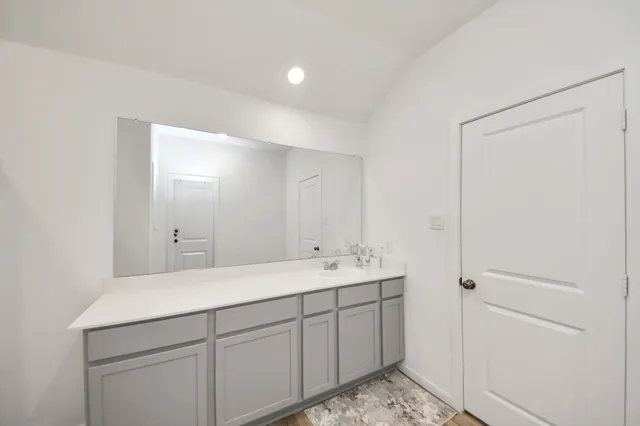 a spacious bathroom with a shower