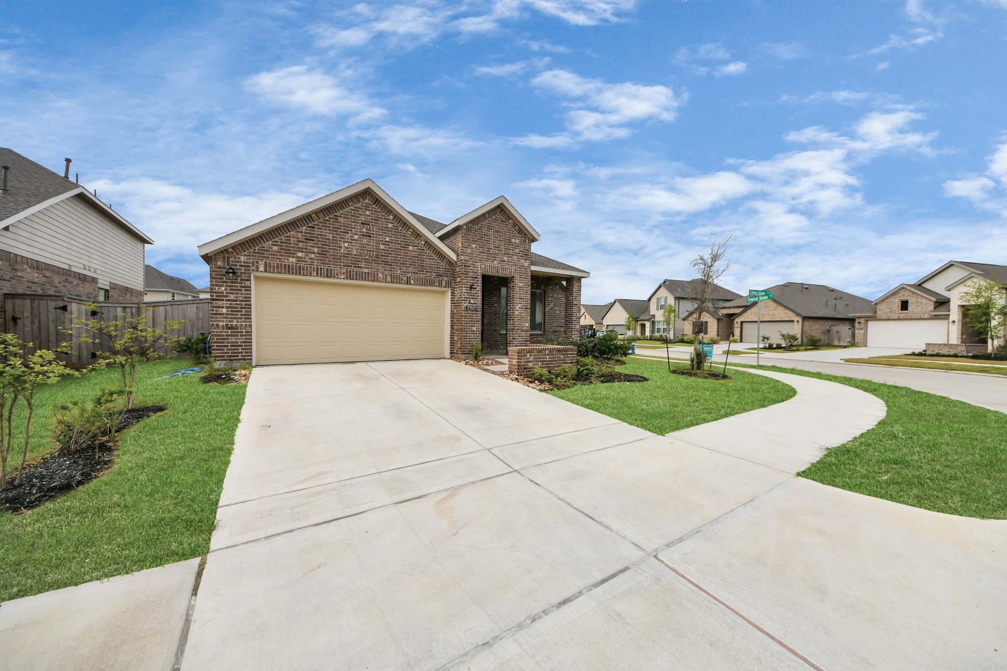 21927 Citrus Grove Cypress, TX 77433 - Photo 4 of 42 a front view of a house with a yard