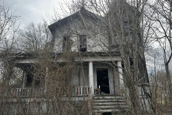 front view of a house with a small yard