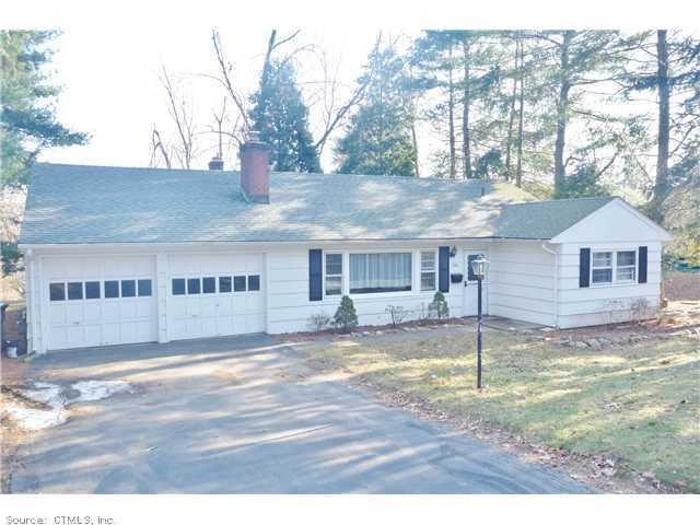 290 Ridgewood Road West Hartford, CT 06107 - Photo 1 of 1 a view of a house with a yard