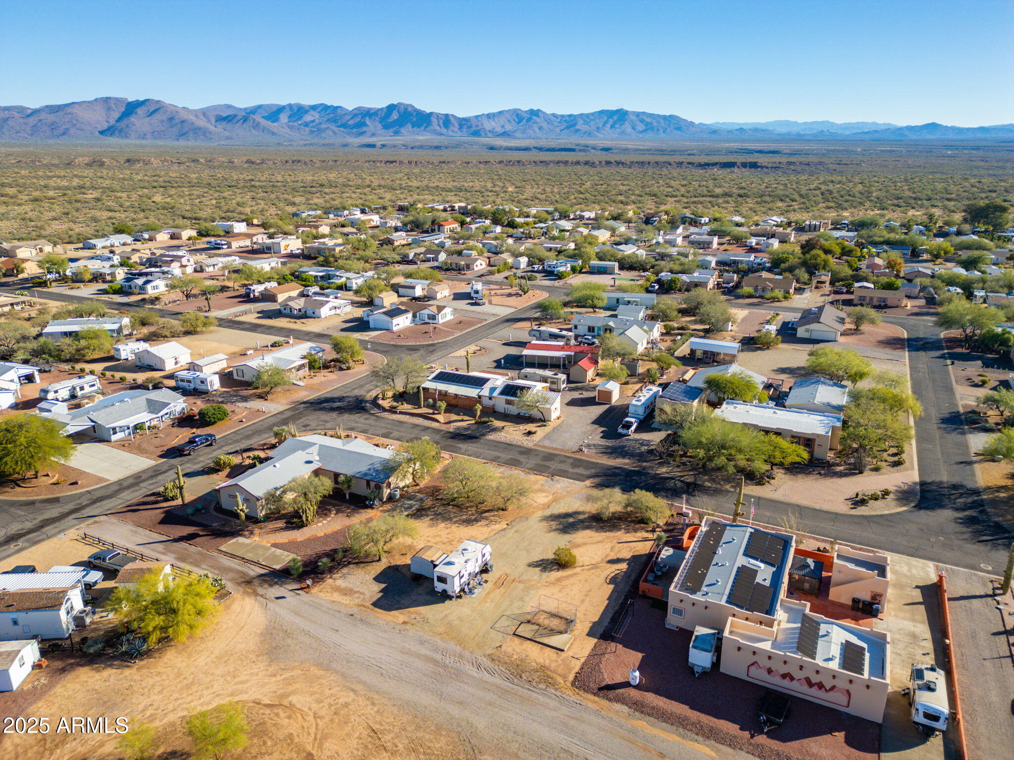 30654 Sun Rider Way, Unit 101 Congress, AZ 85332 - Photo 17 of 28 an aerial view of residential houses with outdoor space
