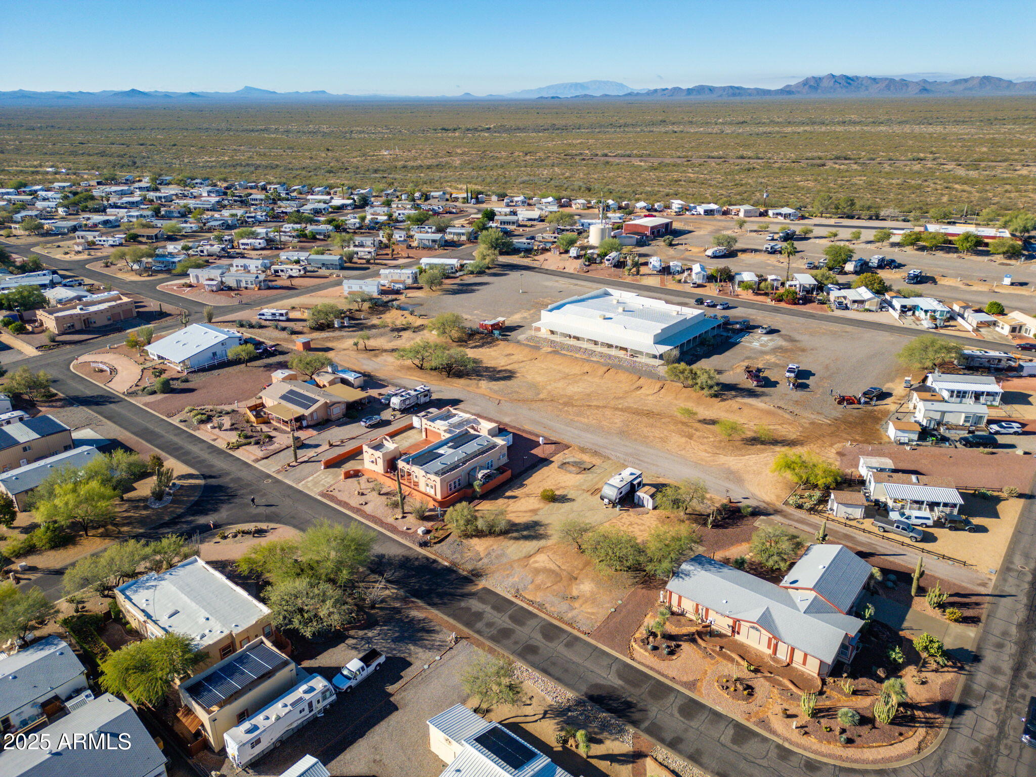 30654 Sun Rider Way, Unit 101 Congress, AZ 85332 - Photo 20 of 28 an aerial view of residential building and ocean