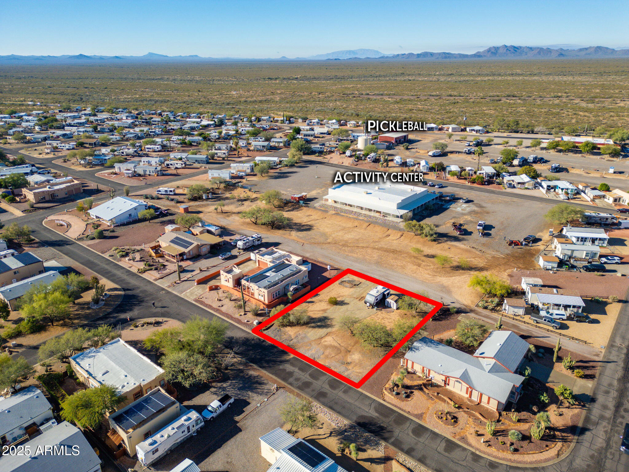 30654 Sun Rider Way, Unit 101 Congress, AZ 85332 - Photo 21 of 28 an aerial view of a city with an ocean