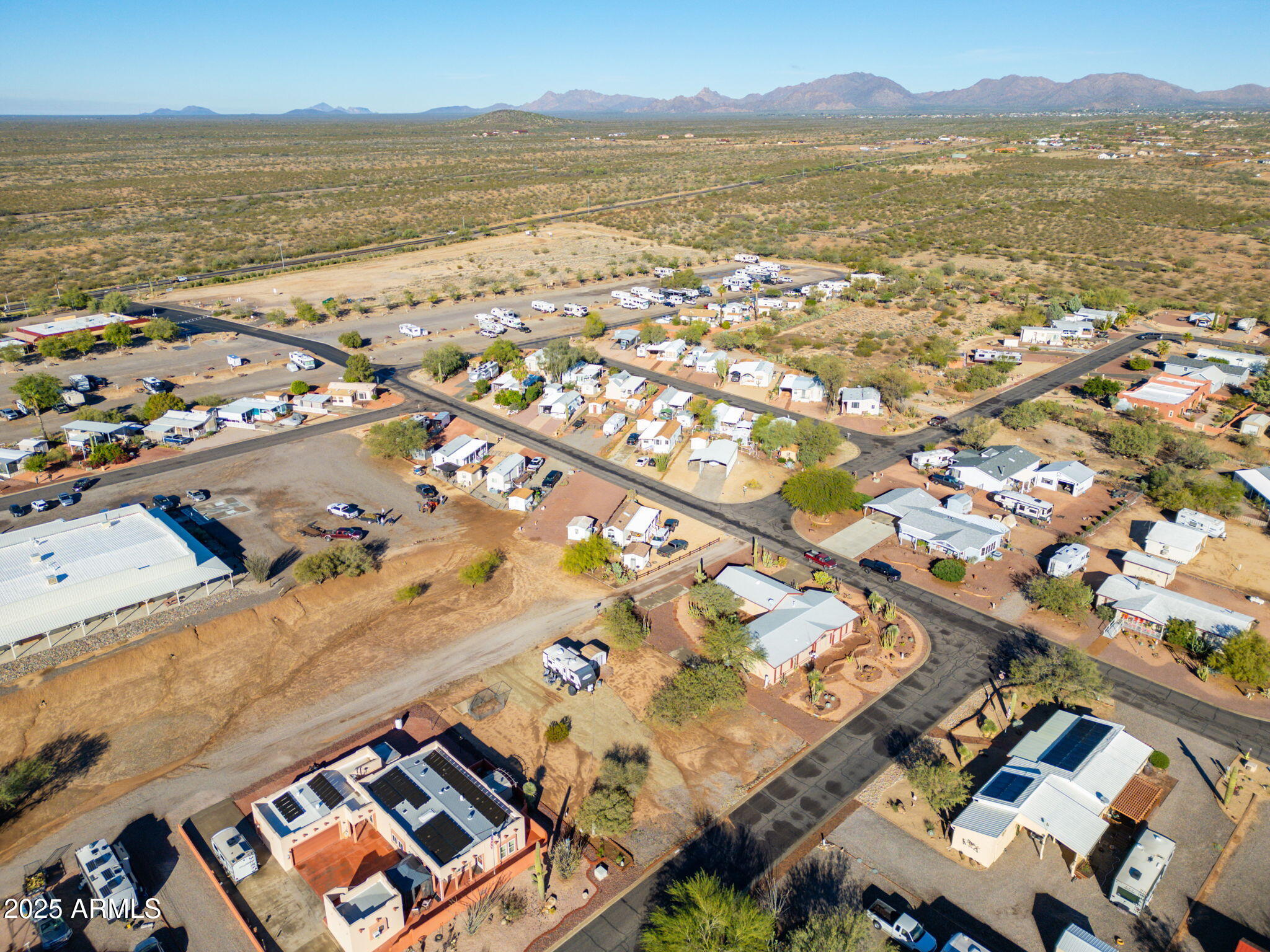 30654 Sun Rider Way, Unit 101 Congress, AZ 85332 - Photo 22 of 28 an aerial view of residential building with outdoor space
