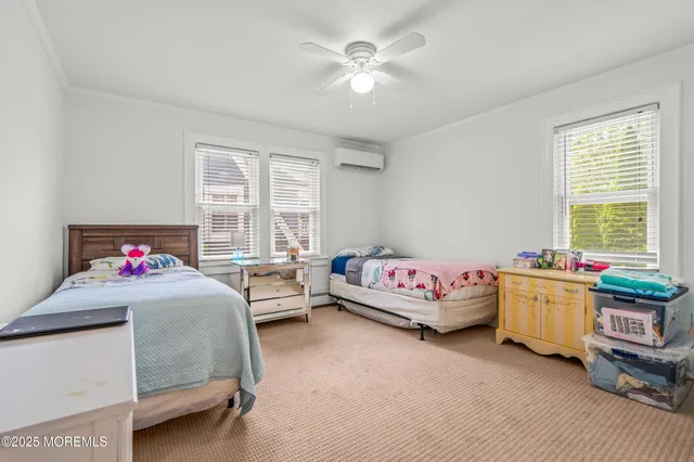 a bedroom with furniture and a bed