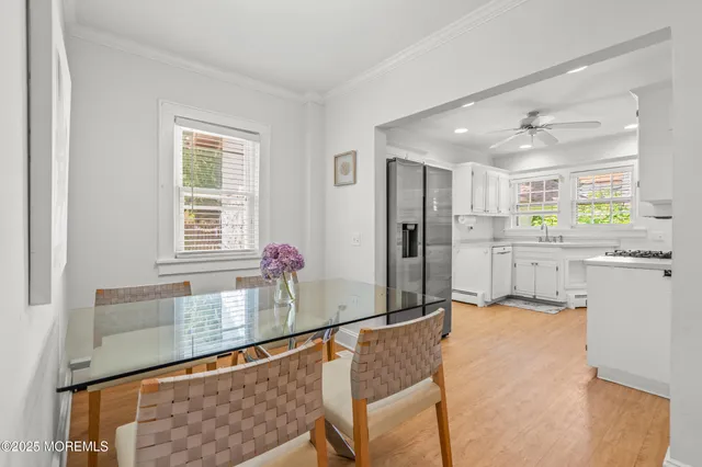 a kitchen with refrigerator and window
