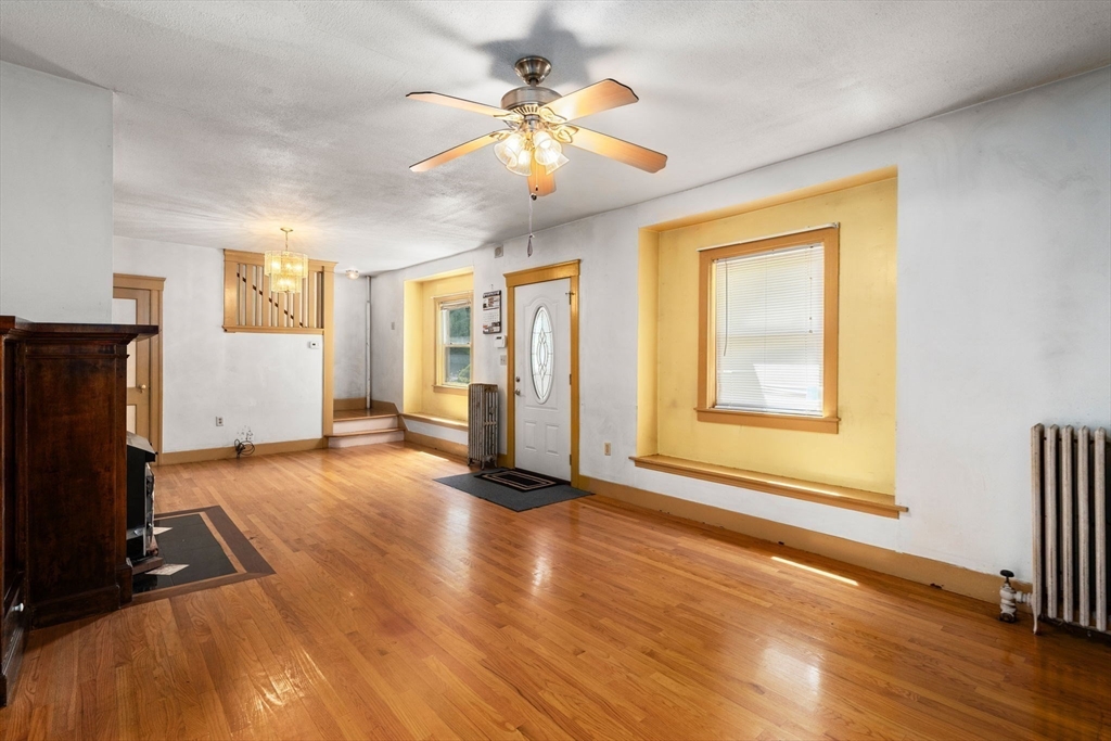 14 Channing Street Worcester, MA 01605 - Photo 3 of 16 a view of an empty room with window and wooden floor