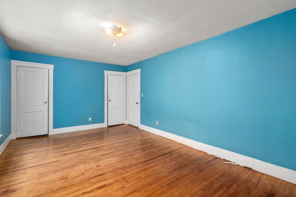 14 Channing Street Worcester, MA 01605 - Photo 10 of 16 a view of an empty room with wooden floor
