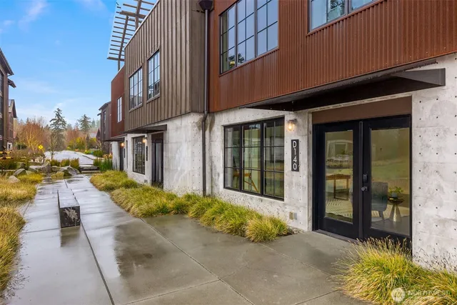 a view of a building with sitting area