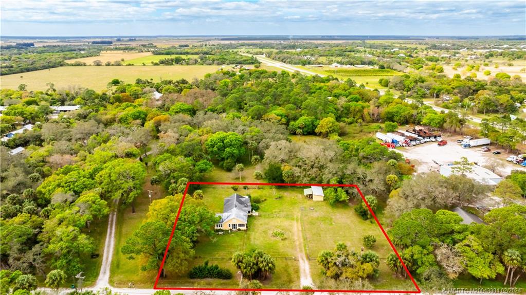 3531 11 Mile Road Fort Pierce, FL 34945 - Photo 6 of 35 a view of an outdoor space and a lake view