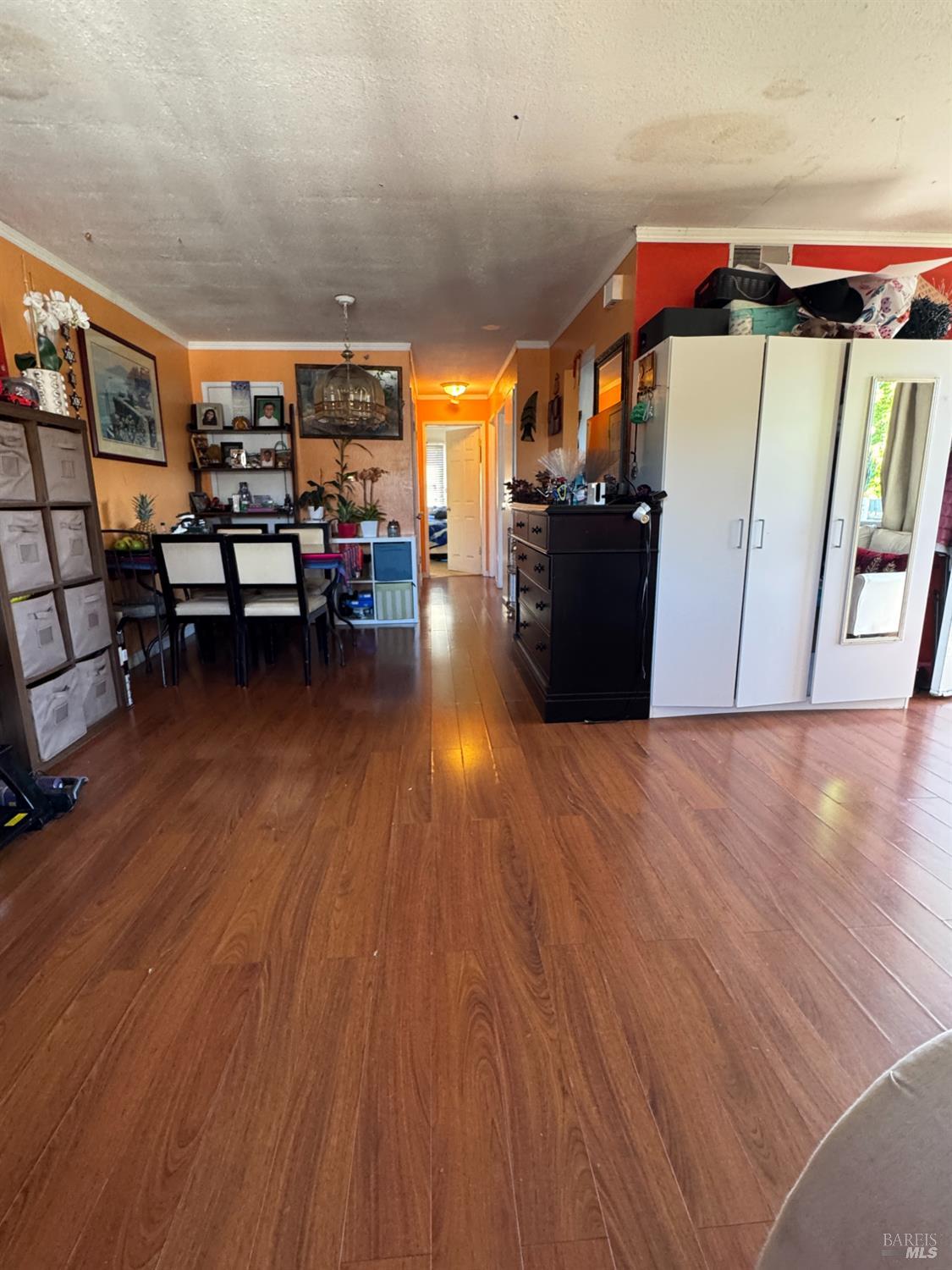 431 Bahia Way San Rafael, CA 94901 - Photo 19 of 46 a view of a room with wooden floor and furniture