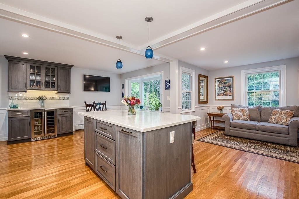 1 Intervale Road Dedham, MA 02026 - Photo 14 of 42 a kitchen with stainless steel appliances granite countertop a stove and cabinets
