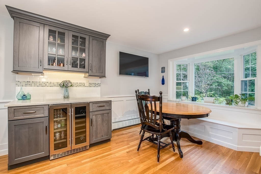 1 Intervale Road Dedham, MA 02026 - Photo 16 of 42 a view of a dining room with furniture and wooden floor