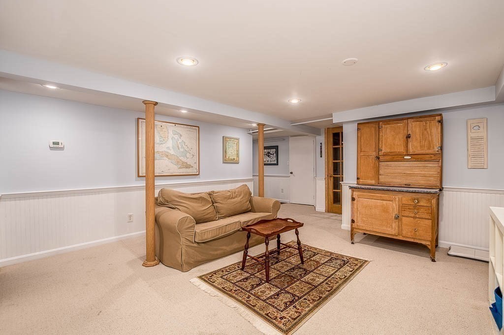 1 Intervale Road Dedham, MA 02026 - Photo 28 of 42 a living room with furniture and a window