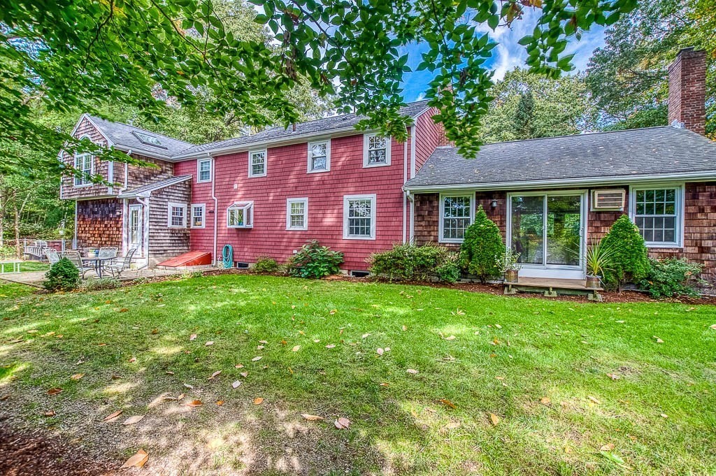 1 Intervale Road Dedham, MA 02026 - Photo 33 of 42 a front view of a house with garden
