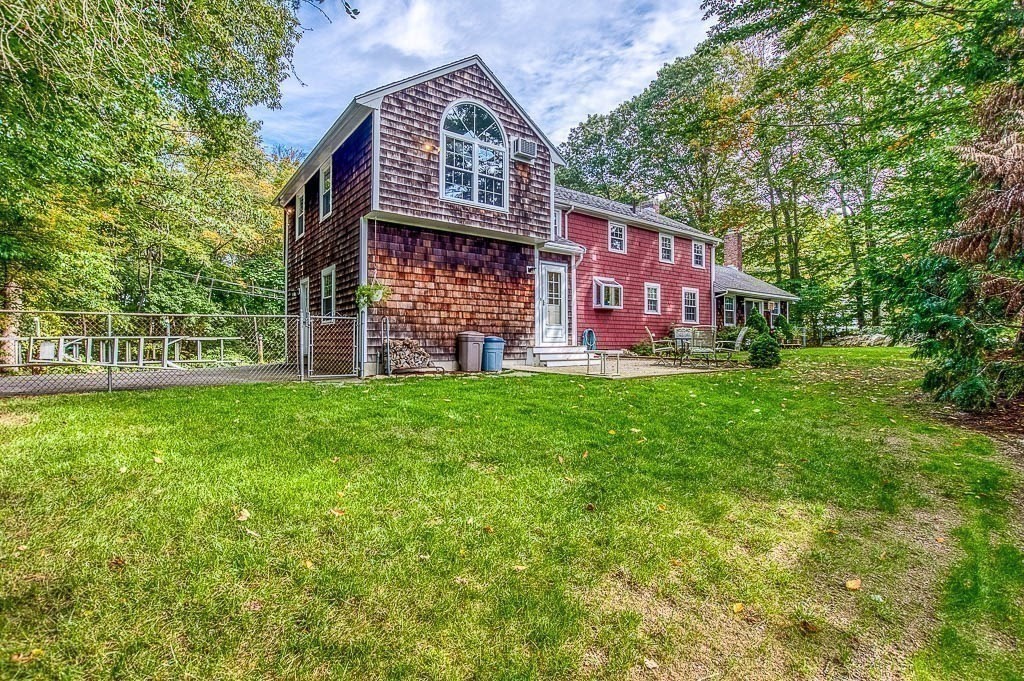 1 Intervale Road Dedham, MA 02026 - Photo 38 of 42 a front view of a house with garden